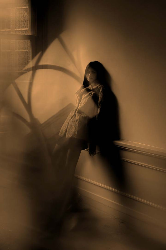 In her absence